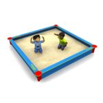 Children playing in large sandbox