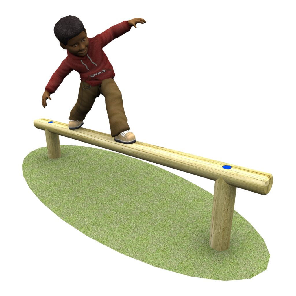 A child balances on a wooden beam set on grass, arms outstretched for balance.