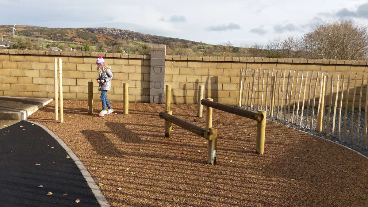 push up beams on a brown mulch surfacing