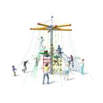 Children and adults climb and play on the Buccaneer Tower, a large rope and net playground structure with multiple levels and connecting ladders.
