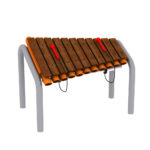 A wooden outdoor xylophone with metal legs, orange resonator tubes, and two red beaters attached by cords.