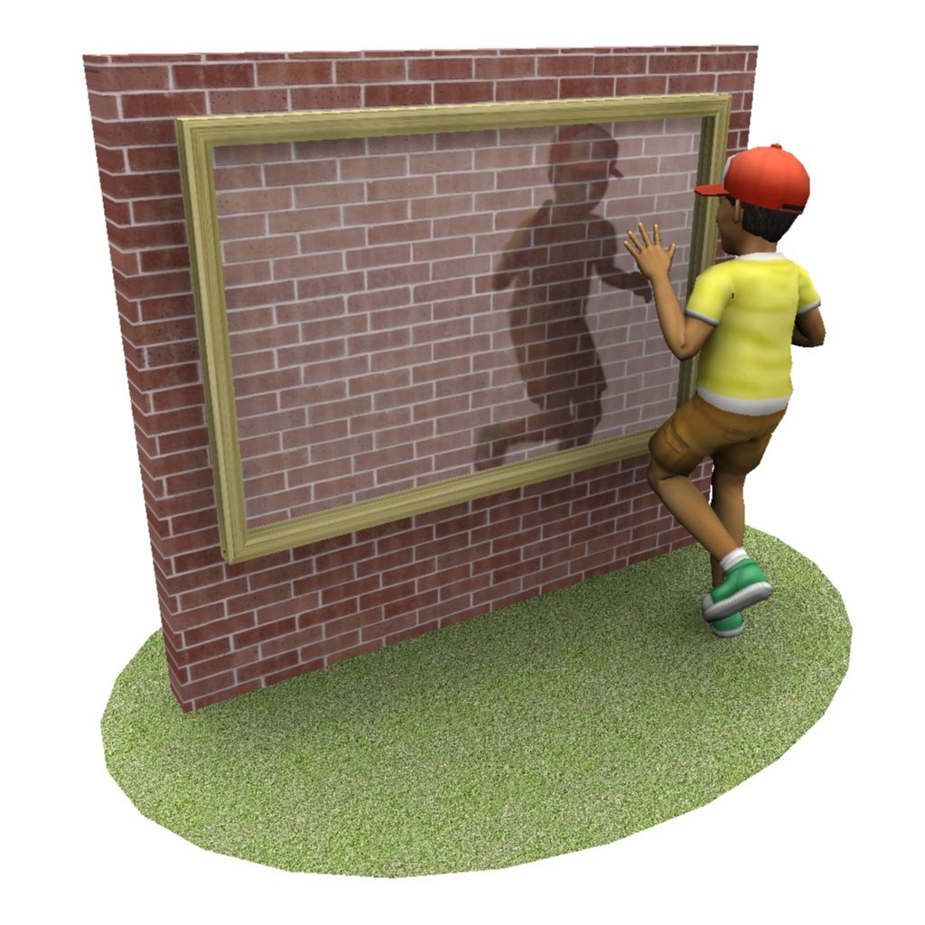 A child in a red cap and yellow shirt looks into a large framed section of a brick wall, casting a shadow on the wall whilst standing on grass.