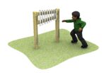 A child in a green hoody stands on grass, reaching towards a wooden outdoor musical chime instrument.