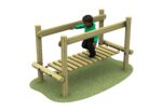A child in a green hoody walks across the Clatter Bridge 2100, a wooden playground bridge structure set on a patch of green artificial grass.