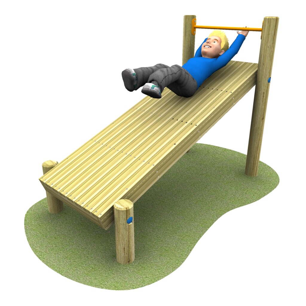 A child in a blue shirt and gray pants swings on a horizontal bar attached to a wooden ramp in an outdoor play area.