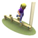 A child in purple clothing balances on wooden playground beams set on grass, with one foot raised mid-step.