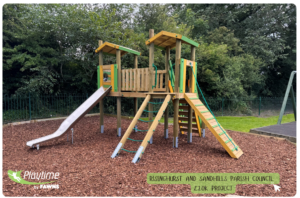 An image of a community play space with a timber climbing frame with green ropes and a steel slide for Risinghurst and Sandhills Council by Playtime by Fawns.