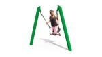A young person in a black vest and pink trousers sits on a swing attached to a green frame, holding both chains. The background is white.