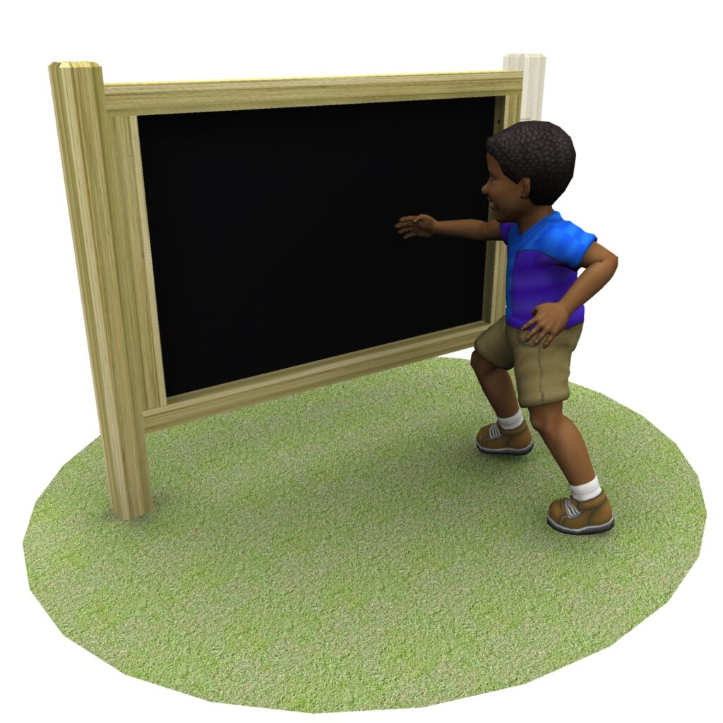 A child stands on grass reaching towards a blank blackboard with a wooden frame.