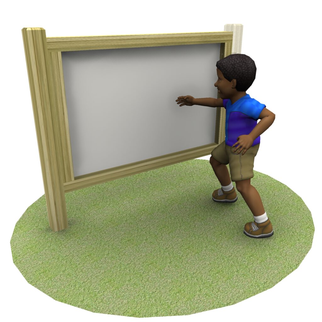 A child stands on grass and reaches towards a large blank wooden-framed adjoining mark making whiteboard.