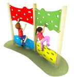 Two children climb on a vertical Link Jigsaw Traverse playground wall structure with colourful panels in red, green, blue, and yellow.