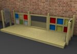A wooden sensory play panel with colourful inserts, chimes, a chalkboard, and textured sections, set against a brick wall on a wooden platform.