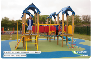 Children play on a colourful outdoor playground structure with slides, climbing nets, and bridges on a soft, rubberised surface.